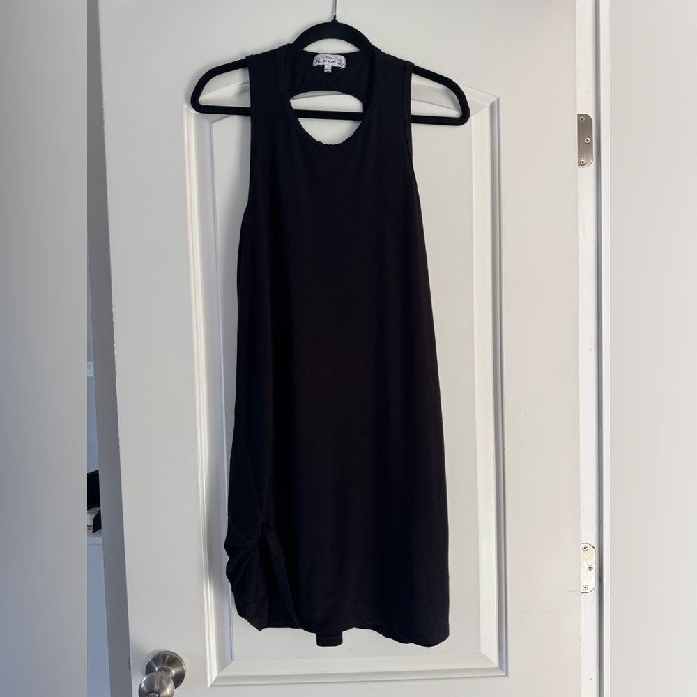 Black dress small with cut out back and knotted asymmetrical hem